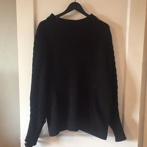 Batwing turtleneck sweater